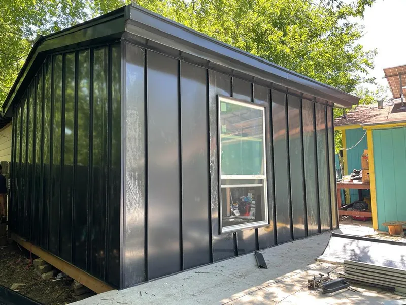 Black standing seam metal wall panels for Roof Inspection in Silver Springs Shores