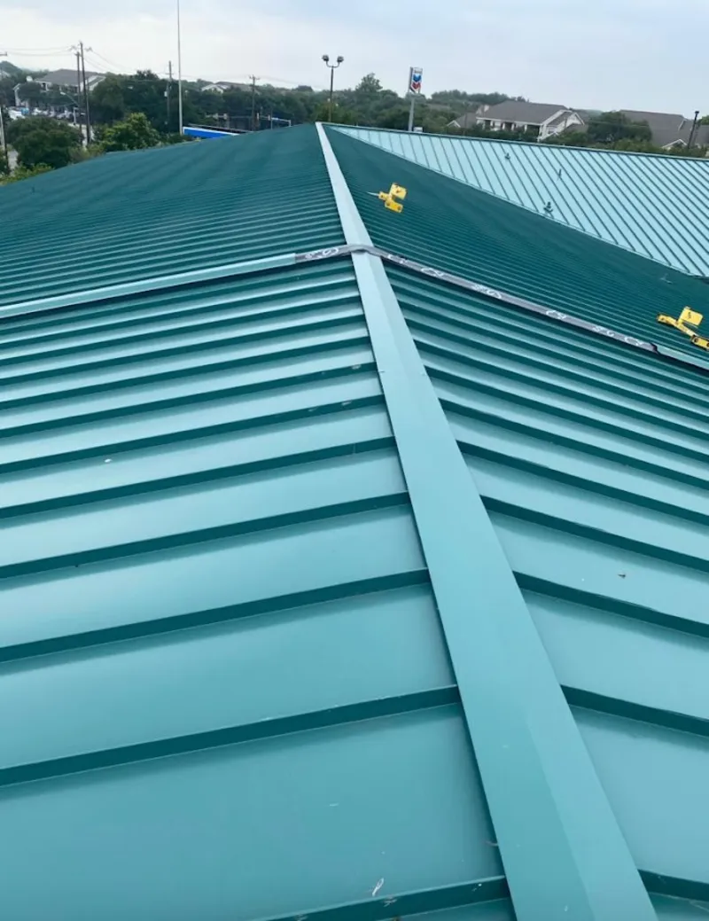 Green commercial metal roof ridge and valley for Metal Roof Repair in Silver Springs Shores